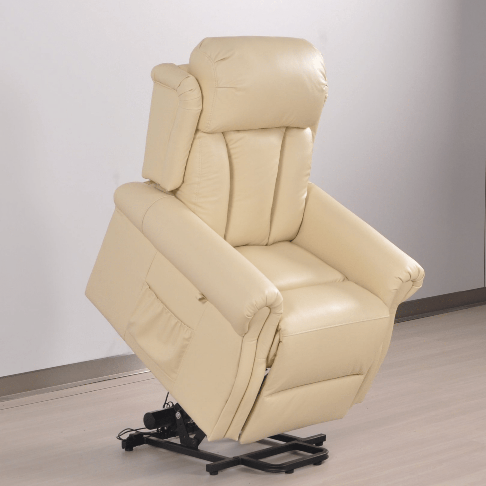 Beige recliner chair on a wooden floor with a neutral wall background