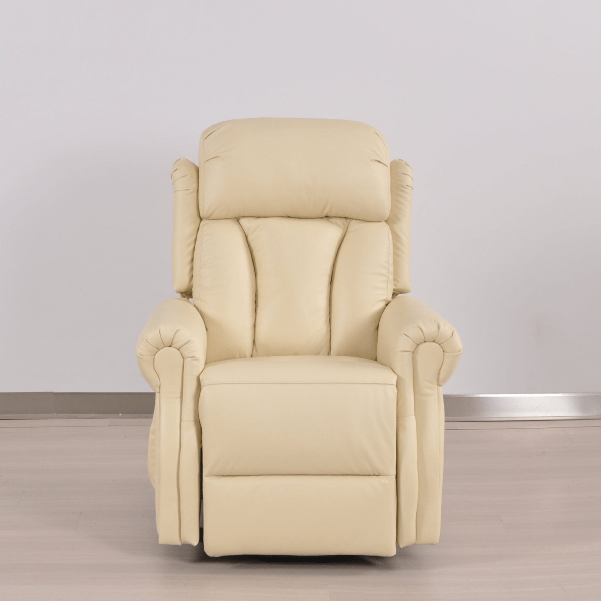 Beige recliner chair on a light wooden floor with a neutral background