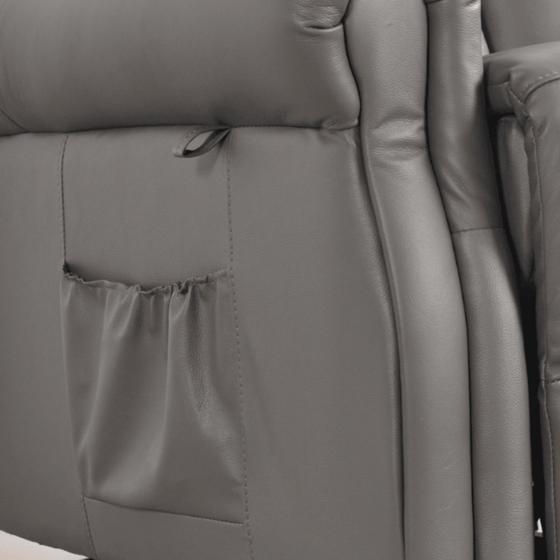 Gray leather armchair with stitching detail