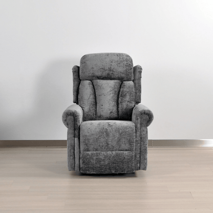 Gray recliner chair in a room with a plain background