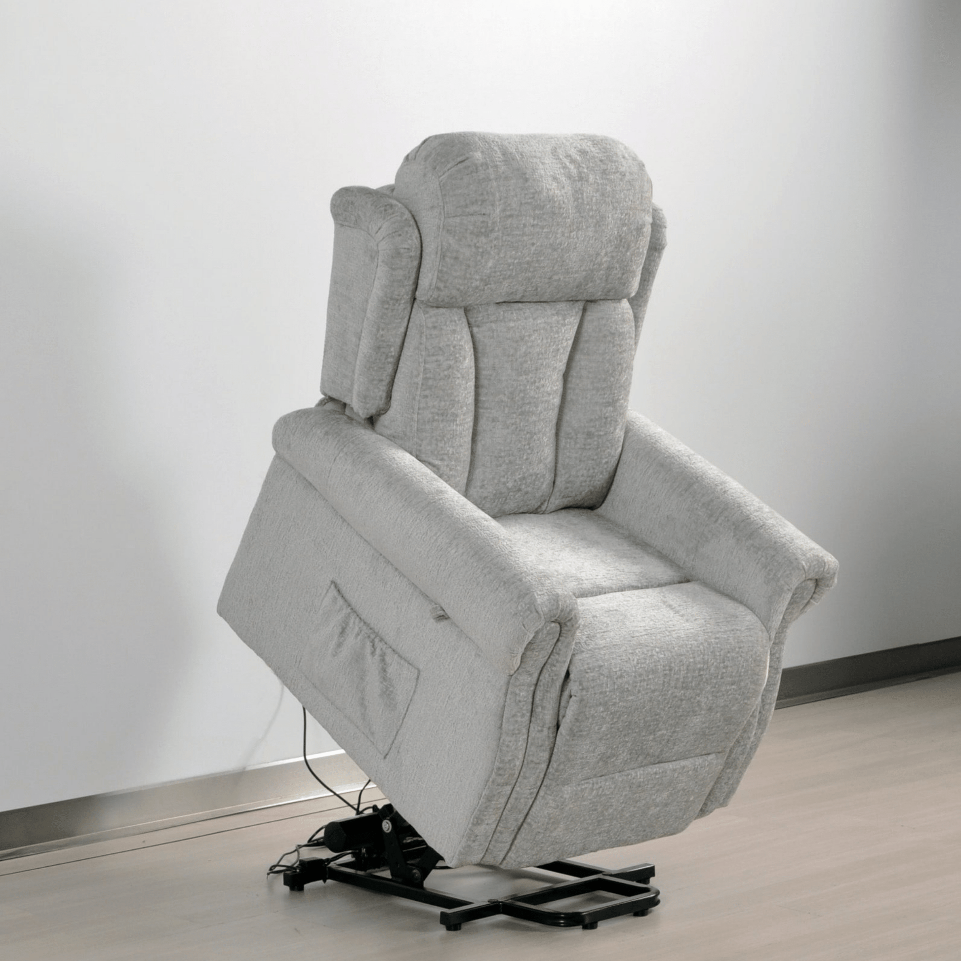 Gray recliner chair with lifting mechanism on a white background