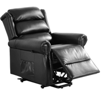 Black leather recliner chair on a white background