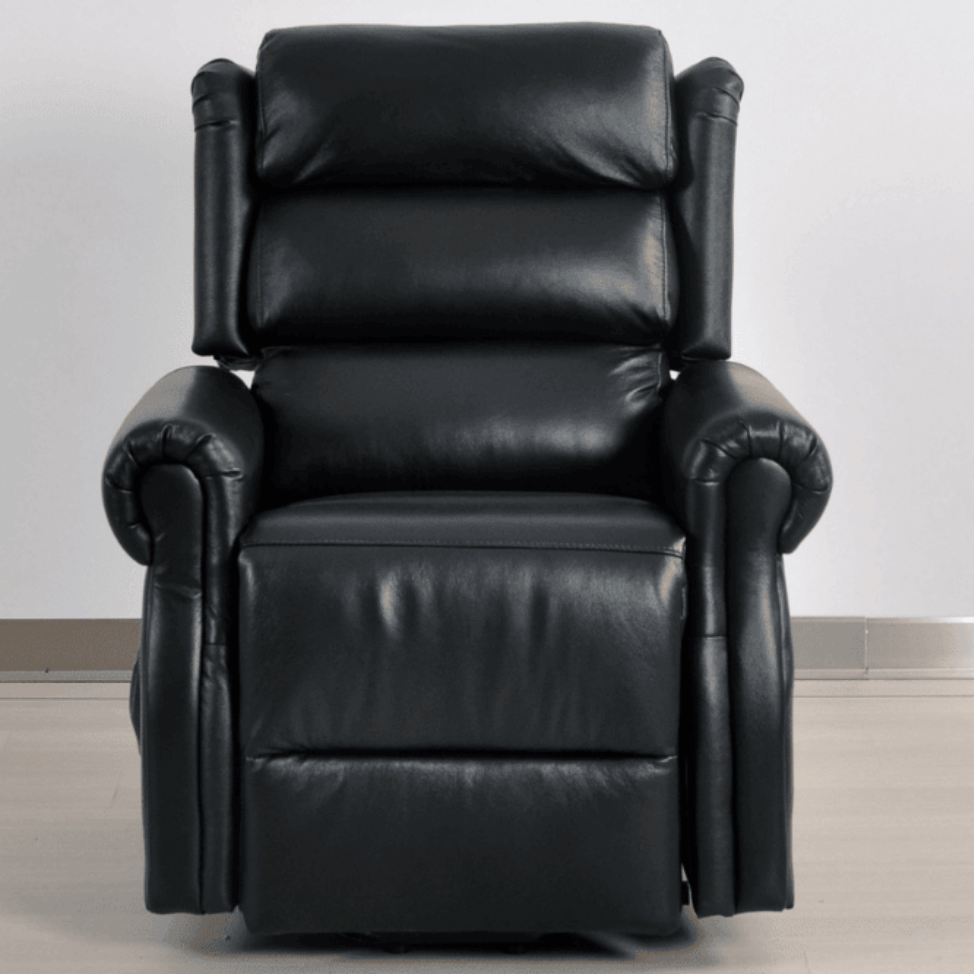 Black leather recliner chair on a light gray background