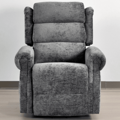 Gray recliner chair on a light wooden floor with a white wall background