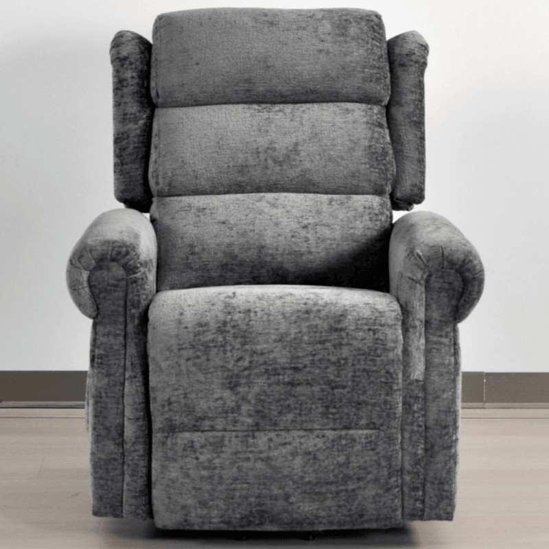 Gray recliner chair on a light wooden floor with a white wall background