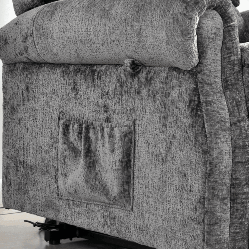 Gray upholstered chair with visible wear and tear on a white background