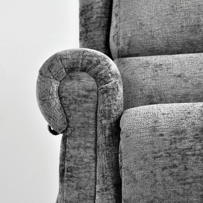 Gray upholstered chair with a textured fabric finish on a white background