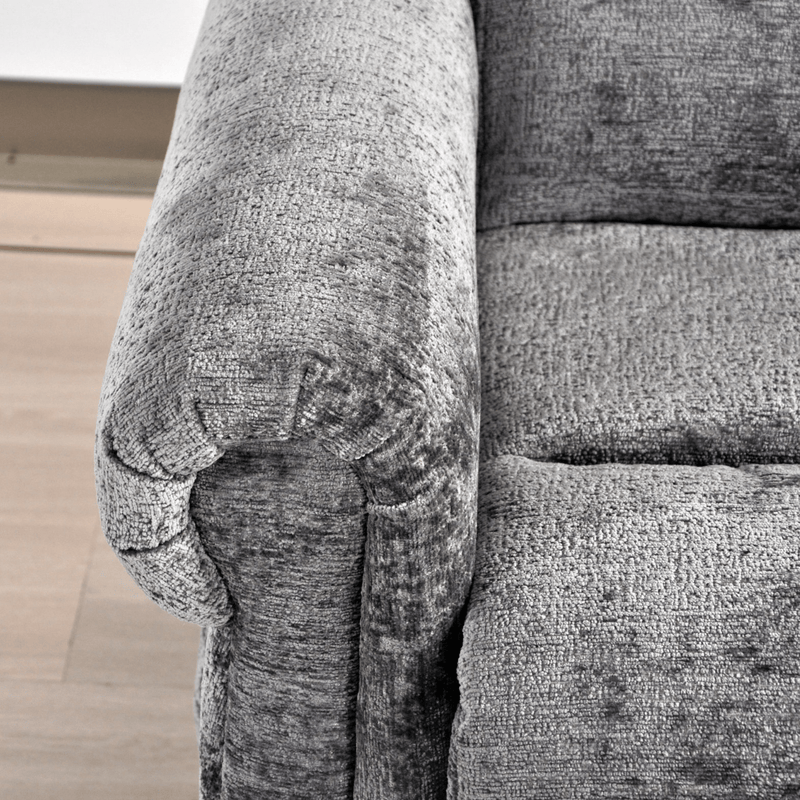 Gray textured fabric on a piece of furniture with a visible brand logo.