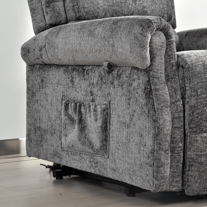 Gray fabric recliner chair with armrest on a wooden floor.