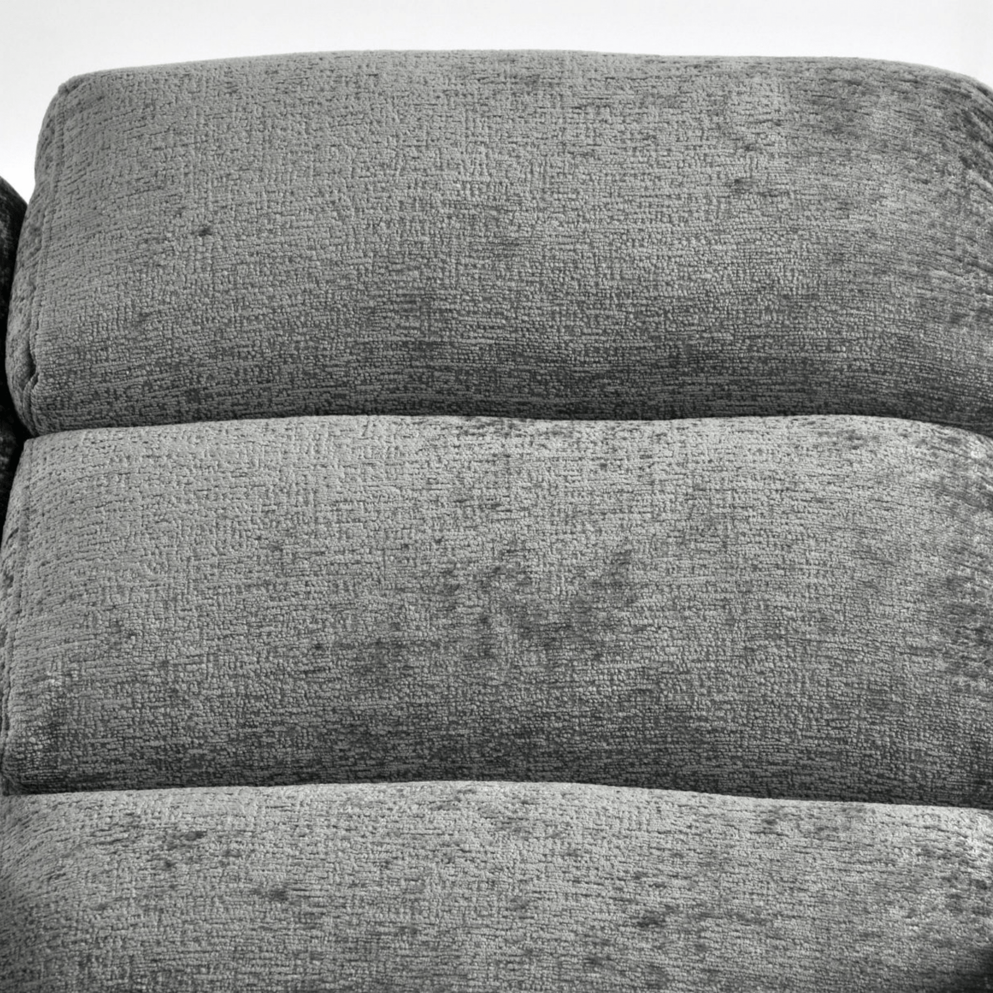 Close-up of a textured gray fabric surface