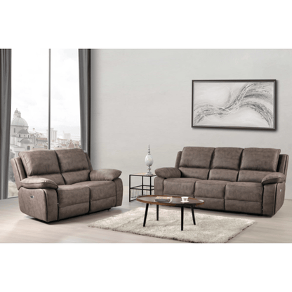 Brown sofa set in a living room with a coffee table and decorative items.
