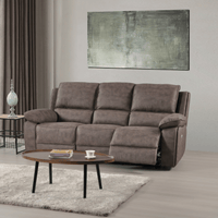 Brown sofa in a living room with a coffee table and abstract painting on the wall.