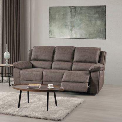 Brown sofa in a living room with a coffee table and abstract painting on the wall.