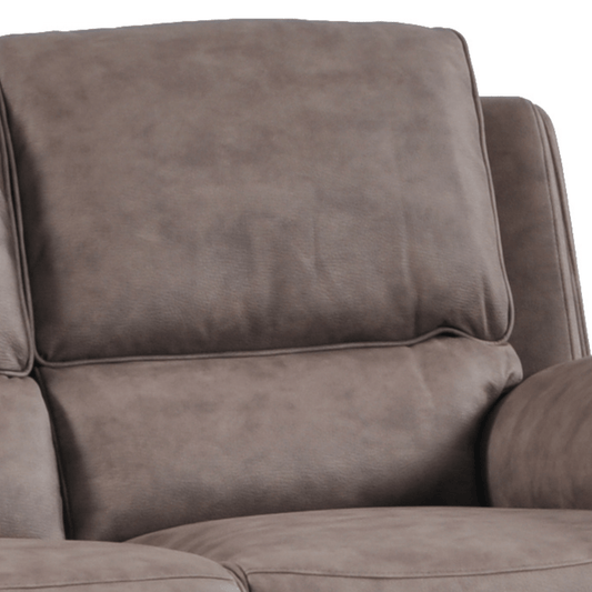 Close-up of a brown recliner chair with visible texture and stitching.
