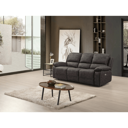 Gray sofa in a modern living room with a coffee table and decorative items.