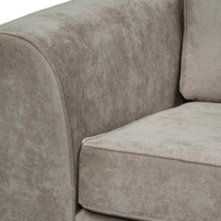 Nancy beige 2-seater sofa close-up highlighting cushions and fabric on a clean white background