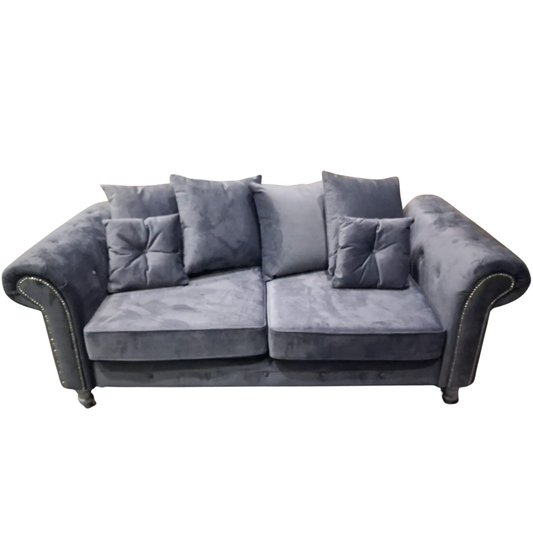 Gray sofa with cushions on a white background