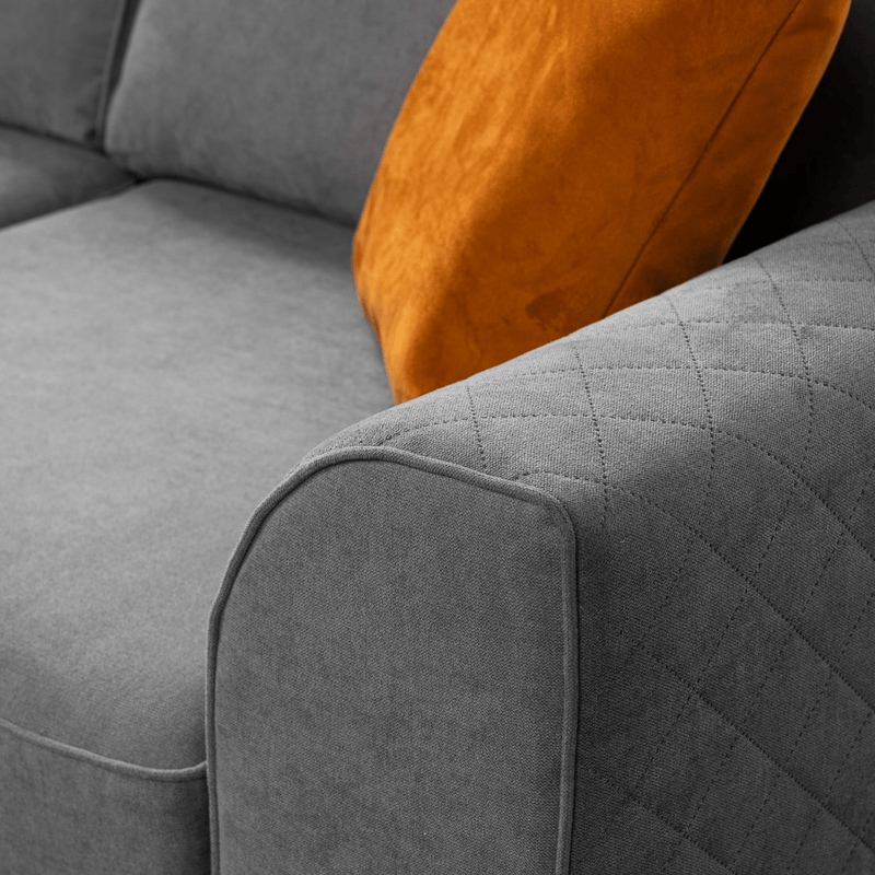 Close-up of Ocra grey left-hand corner sofa armrest on a white background, highlighting fabric texture and stitching details