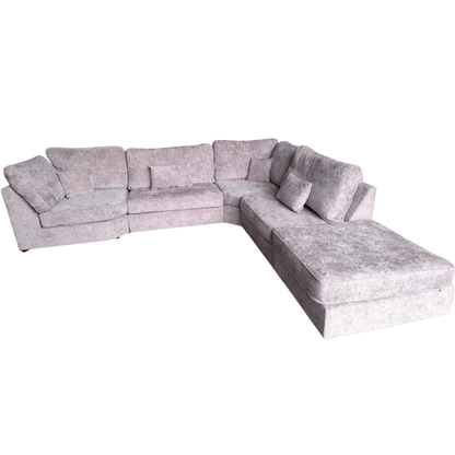 alaska fabric pink corner sofa on a white background with footstool