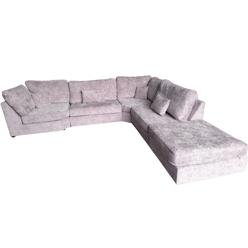 alaska fabric pink corner sofa on a white background with footstool