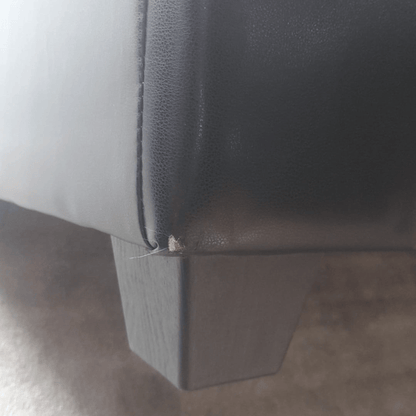 Close-up of a gray car seat with a visible seam.