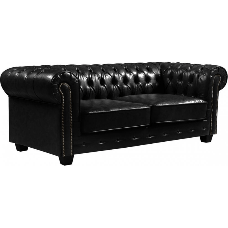 Black leather sofa with tufted backrest on a white background