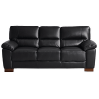 Black leather sofa on a white background