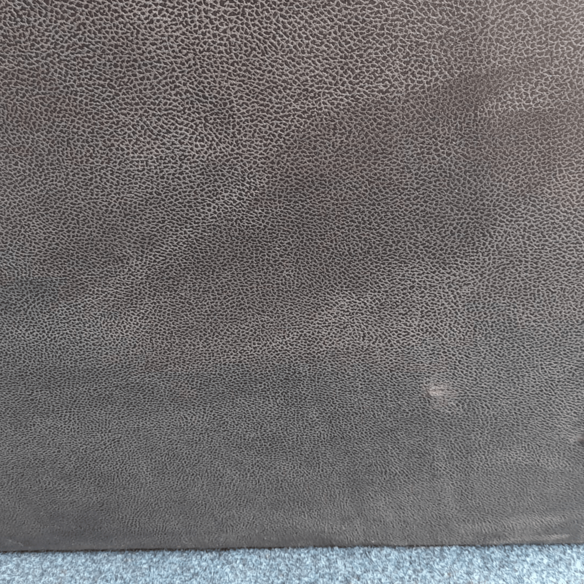 Close-up of a textured gray fabric surface