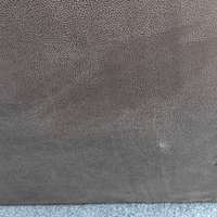 Close-up of a textured gray fabric surface