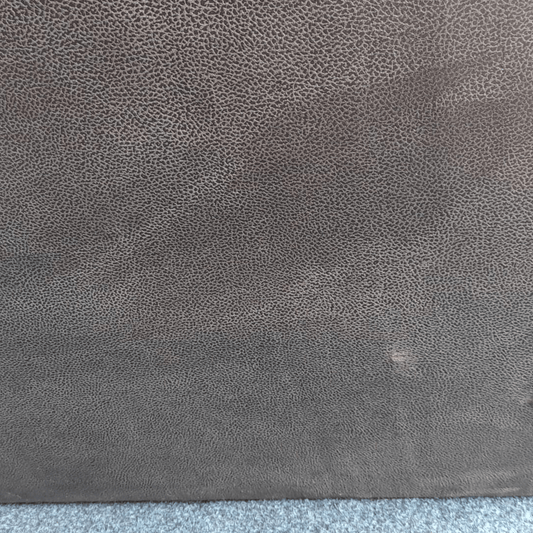 Close-up of a textured gray fabric surface