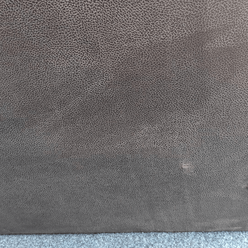 Close-up of a textured gray fabric surface