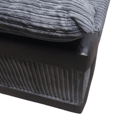Gray textured blanket on a black surface
