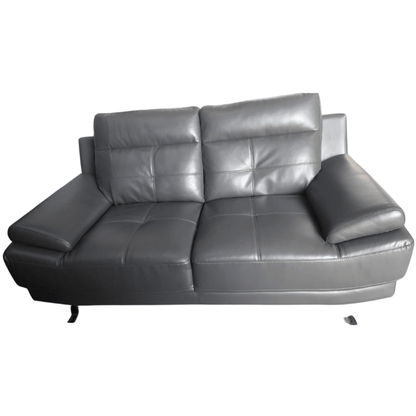 Gray leather sofa on a white background