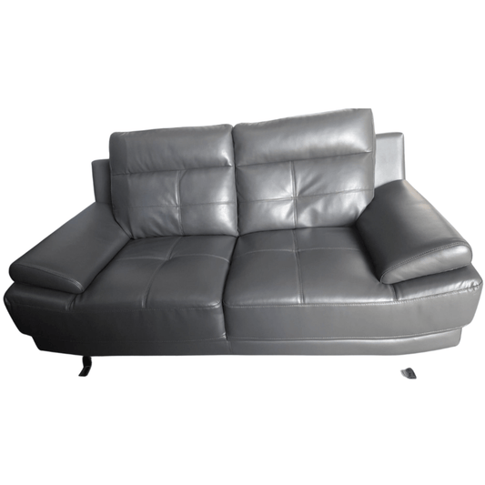 Gray leather sofa on a white background