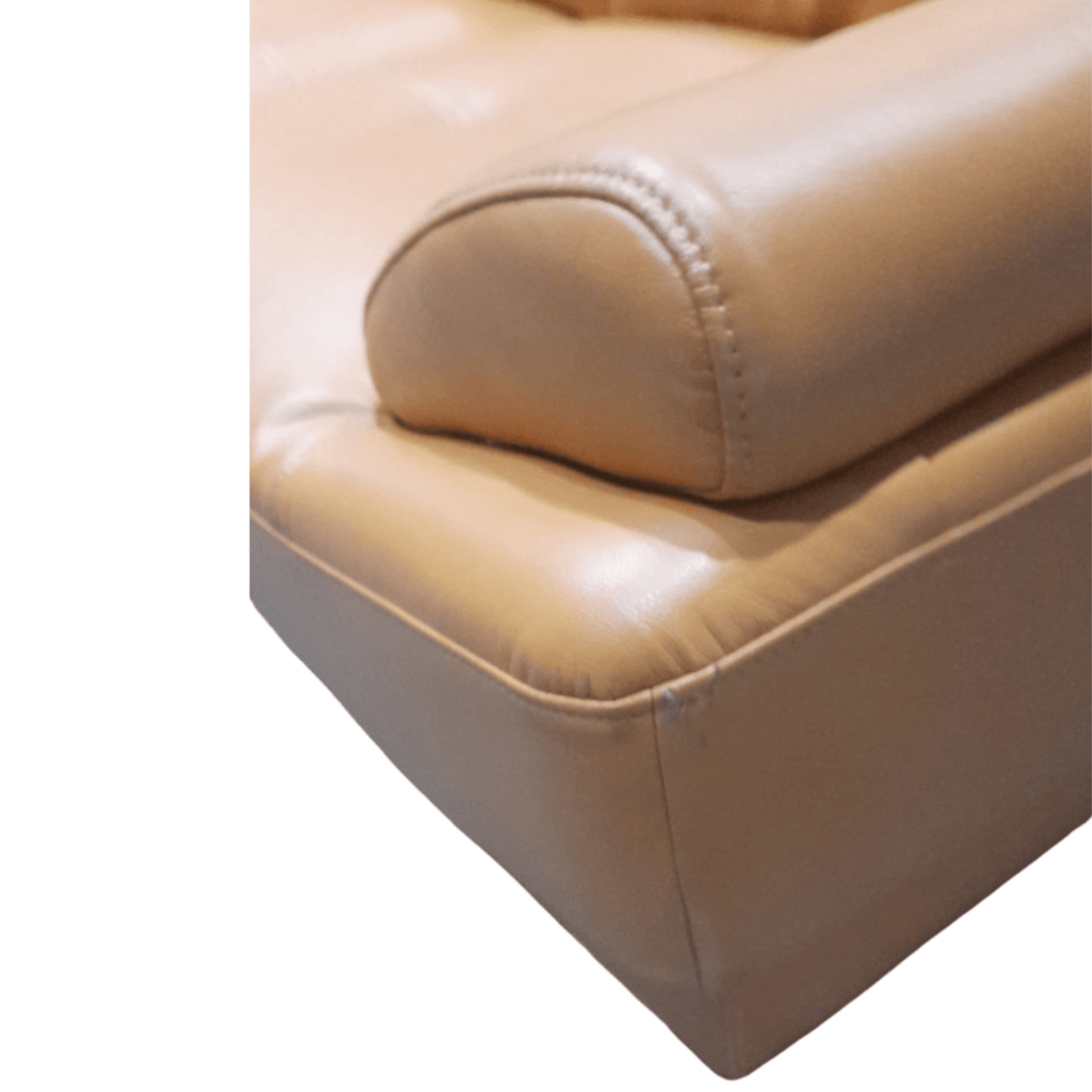 Beige leather armchair on a white background