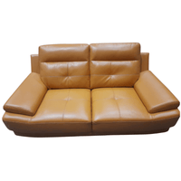 Brown leather sofa on a white background