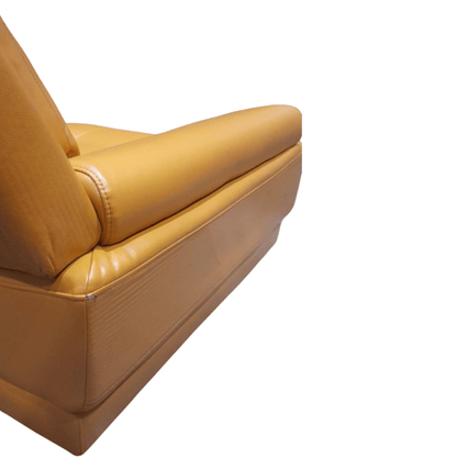 Yellow leather sofa on a white background