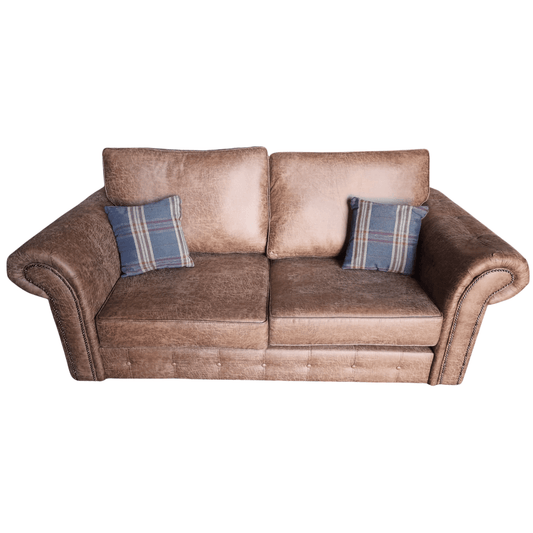 Brown sofa with plaid cushions on a white background