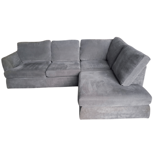 grey fabric corner sofa on a white background 