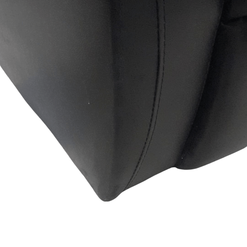 close up of black leather 3 seater sofa 