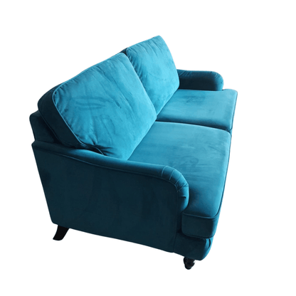 Blue sofa with cushions on a white background