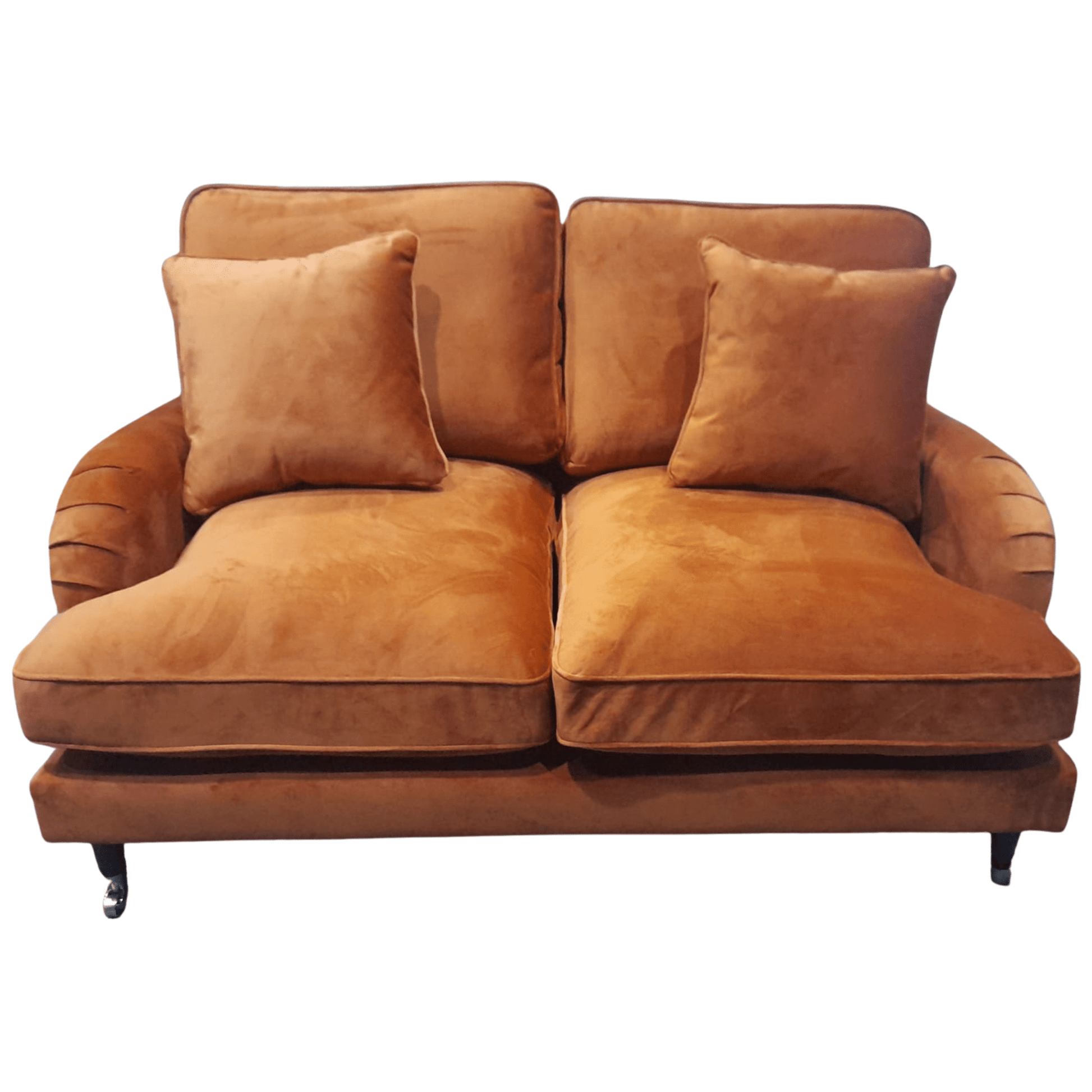 Brown sofa with two cushions on a white background