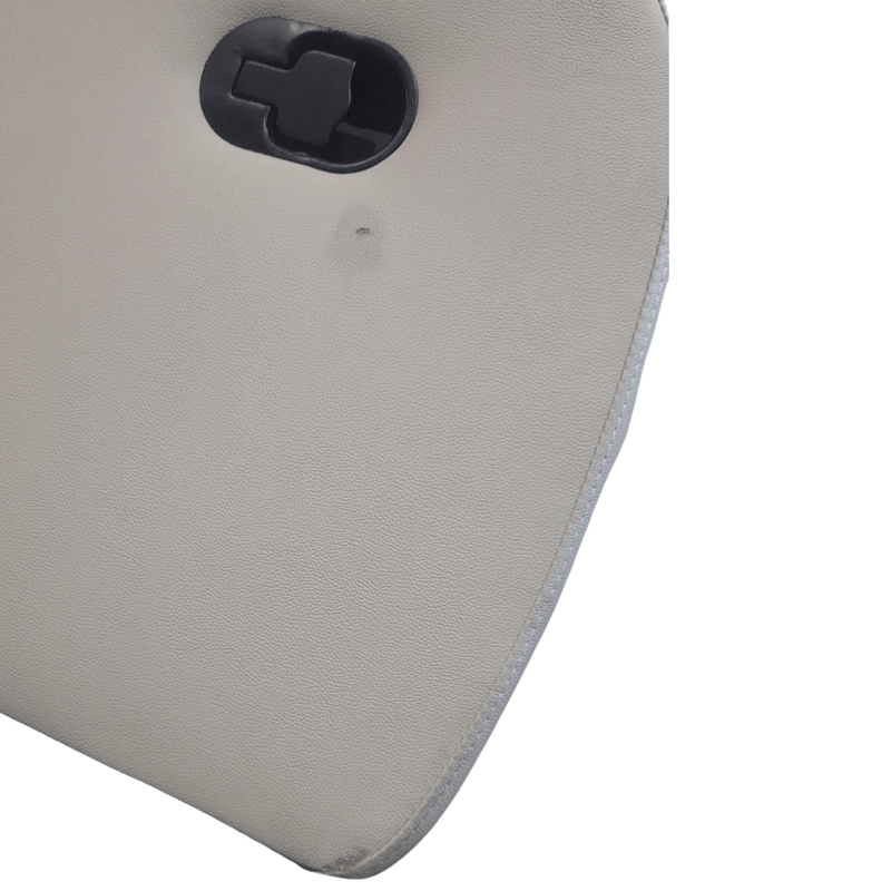 close up of manual recliner cream sofa