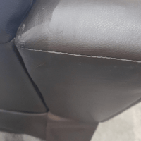 Close-up of a car seat with visible stitching