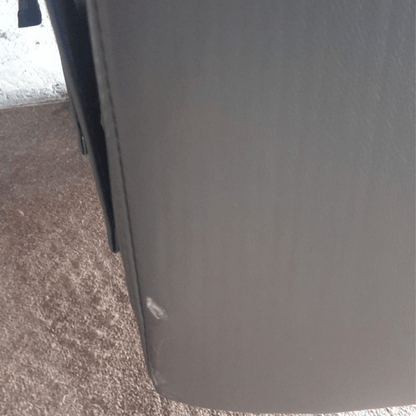 grey leather outlet sofa with cuts 