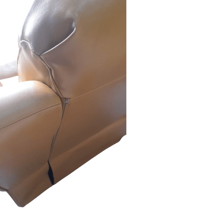 Close-up of a beige leather car seat with visible stitching on a white background