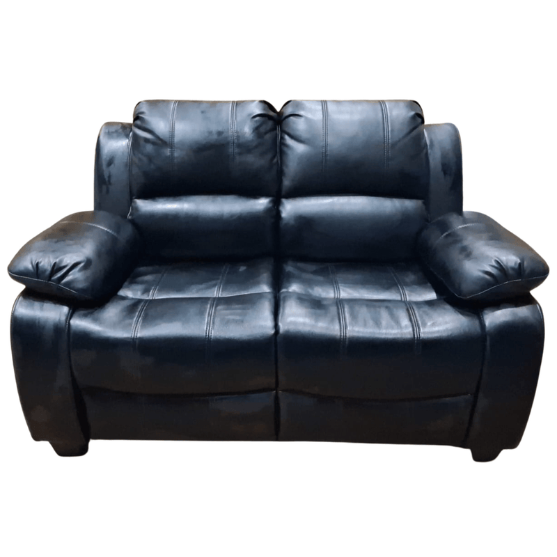 Black leather sofa on a white background