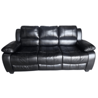 Black leather sofa on a white background