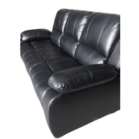 Black leather sofa on a white background