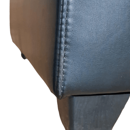 close up of black leather sofa